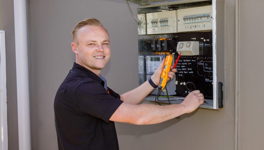 Wollongong electrician upgrading a switchboard