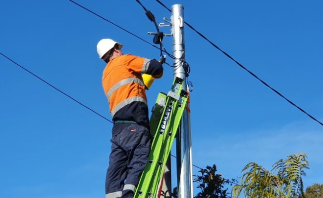 Electrician Wollongong installing a private electricity pole in Wollongong