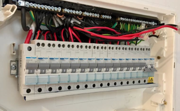 Electrician performing a Switchboard upgrade and repair in Wollongong